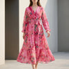 Pink FJØRNA belted tiered A-line wrap maxi dress for women, featuring flowing fabric and elegant design.