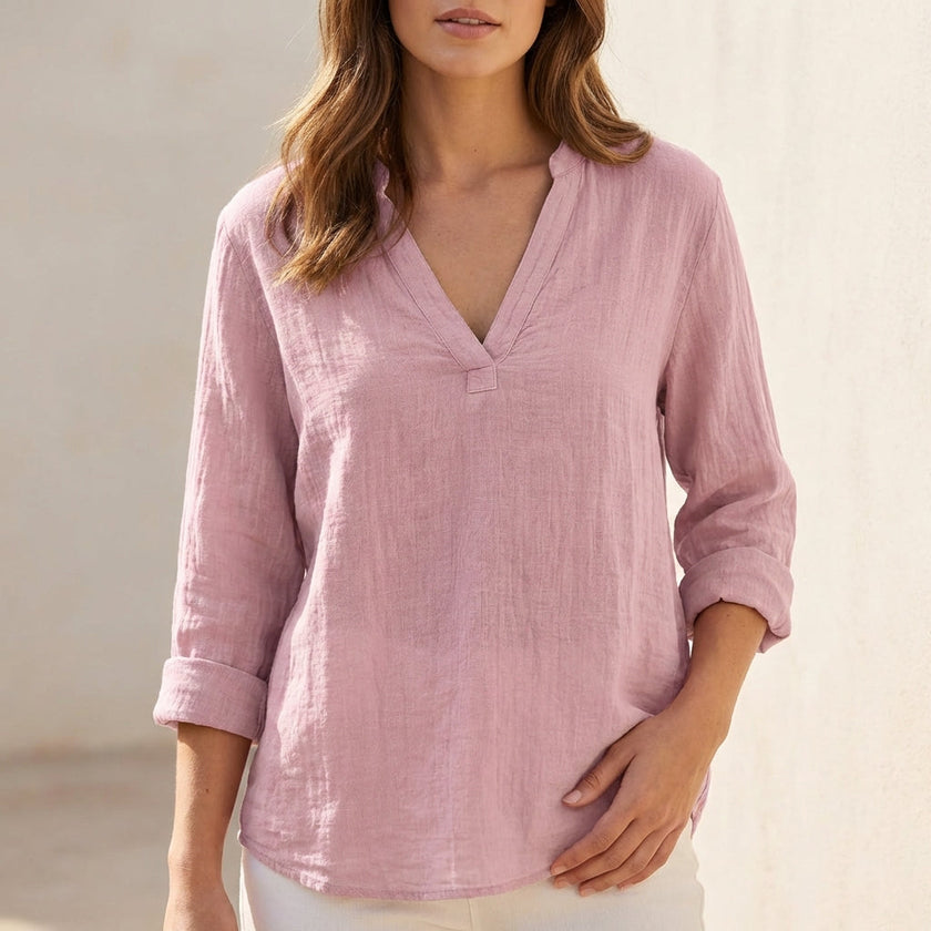 Pink FJØRNA women's summer blouse with V-neck, lightweight linen fabric, casual style, perfect for warm weather.
