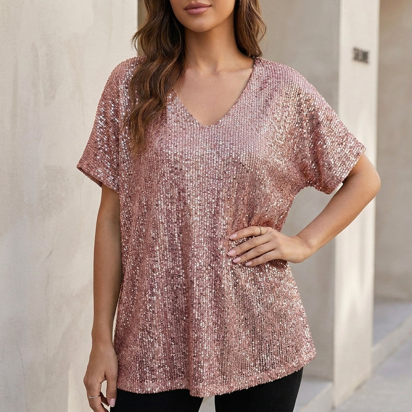 Pink FJØRNA women’s sequined V-neck top with short sleeves, draped style, ideal for evening wear.