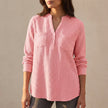 Pink textured button-front blouse for women by FJØRNA with chest pockets and relaxed fit, suitable as casual or office tops.