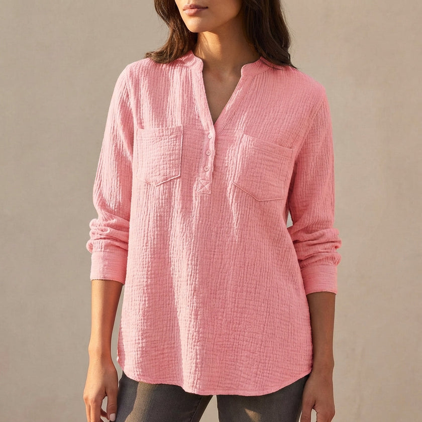 Pink textured button-front blouse for women by FJØRNA with chest pockets and relaxed fit, suitable as casual or office tops.