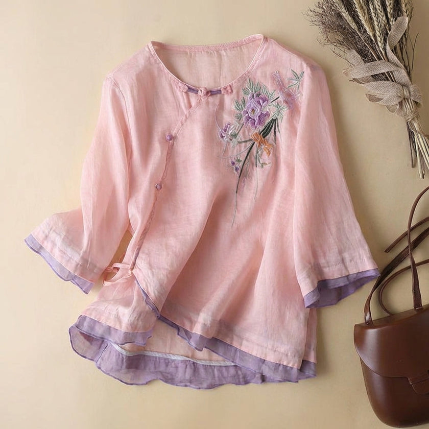 Pink floral V-neck linen blouse for women by FJØRNA, featuring lightweight fabric and stylish summer top design.