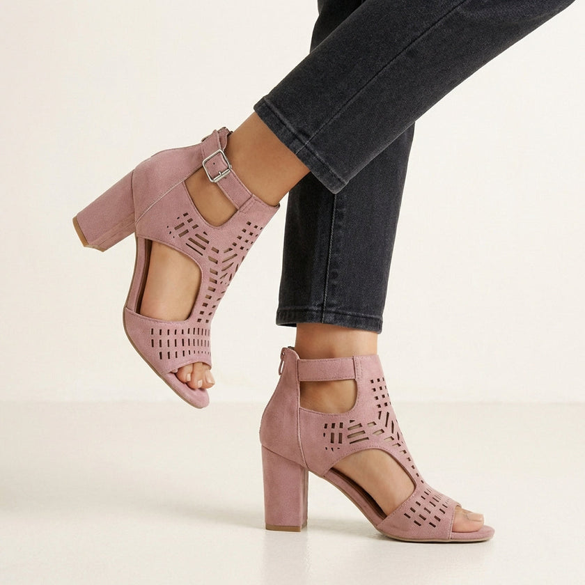 Pink FJØRNA women's orthopedic heeled sandals with adjustable strap and buckle, featuring a supportive design and stylish heel.