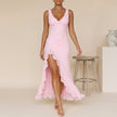 Pink FJØRNA flowing chiffon maxi dress with ruched bodice and ruffled slit, elegant and lightweight for summer wear.