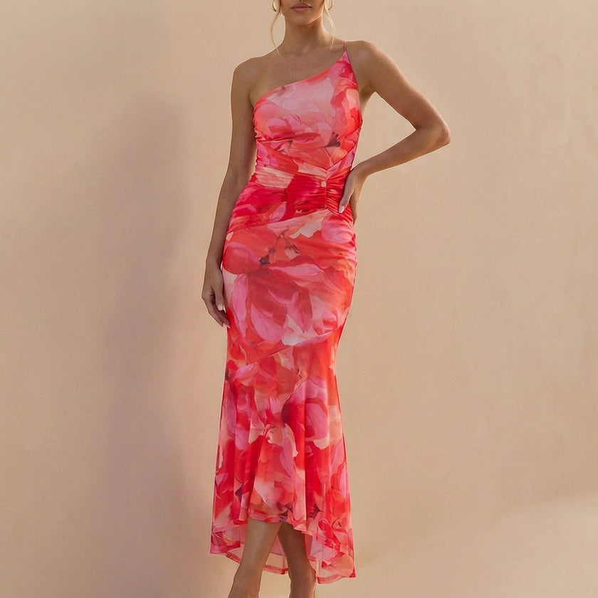 Pink FJØRNA fitted one-shoulder maxi dress with mesh overlay and ruched detailing, perfect for elegant evening wear.