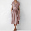 Pink FJØRNA women's midi dress with v-neck and short sleeves, elegant and stylish for casual or semi-formal occasions.