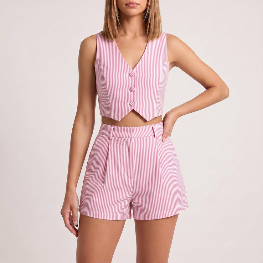Pink FJØRNA women's two-piece co-ord set with pleated V-neck top and matching skirt, stylish and elegant for casual or dressy occasions.