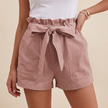 Pink linen summer shorts for women with high waist and pockets, by FJØRNA, styled for warm weather and casual comfort.