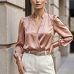Pink FJØRNA women's satin V-neck summer blouse, stylish sleeveless top with elegant drape and soft fabric.