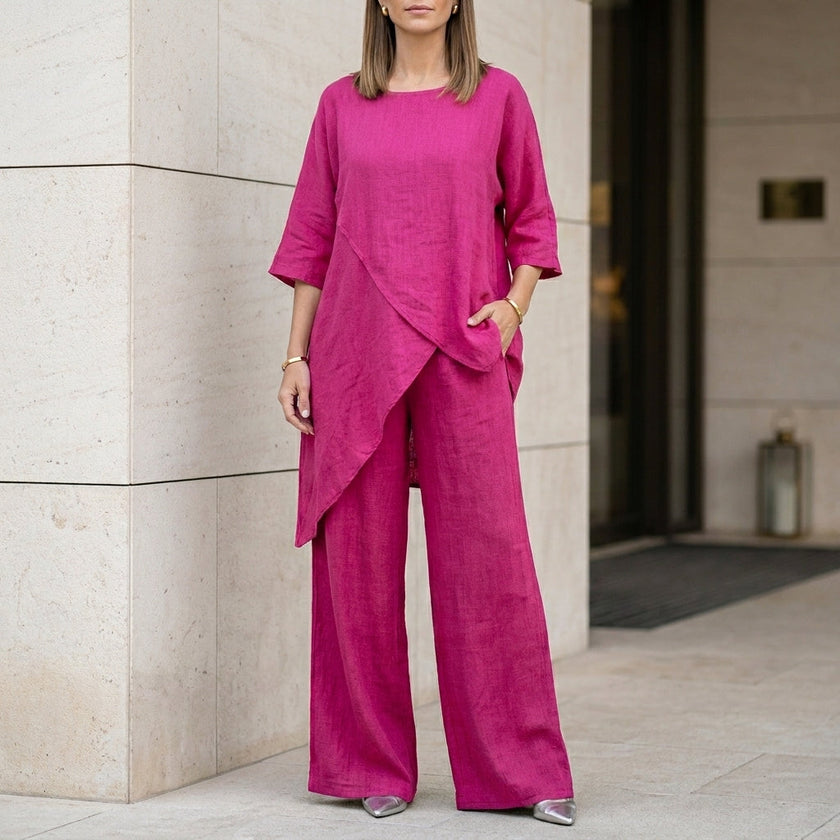 Pink FJØRNA relaxed two-piece set with flowing wide-leg pants, casual and elegant loungewear ensemble.