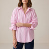 Pink linen summer top for women with button front from FJØRNA, featuring a lightweight, breathable design.