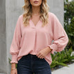 Pink FJØRNA summer women's V-neck denim blouse with ruffle detailing, lightweight and stylish for warm weather.