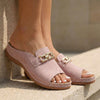 Pink FJØRNA orthopedic slip-on sandals with buckle embellishment, featuring a comfortable and supportive design for everyday wear.
