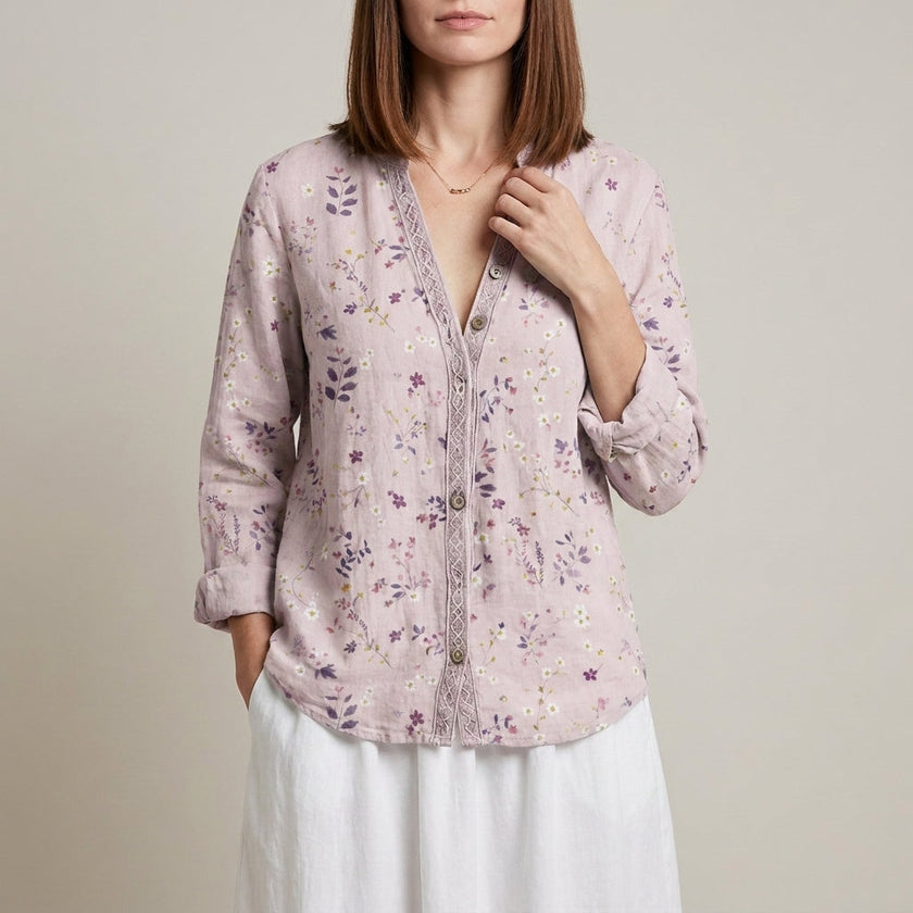 Pink floral V-neck long sleeve linen summer blouse for women by FJØRNA, shown on a model.