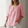 Pink FJØRNA women's summer blouse with v-neck, linen fabric, flowy and lightweight for warm weather.