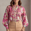 Pink FJØRNA floral summer blouse for women with long sleeves and ruffle detailing, perfect for warm-weather casual wear.
