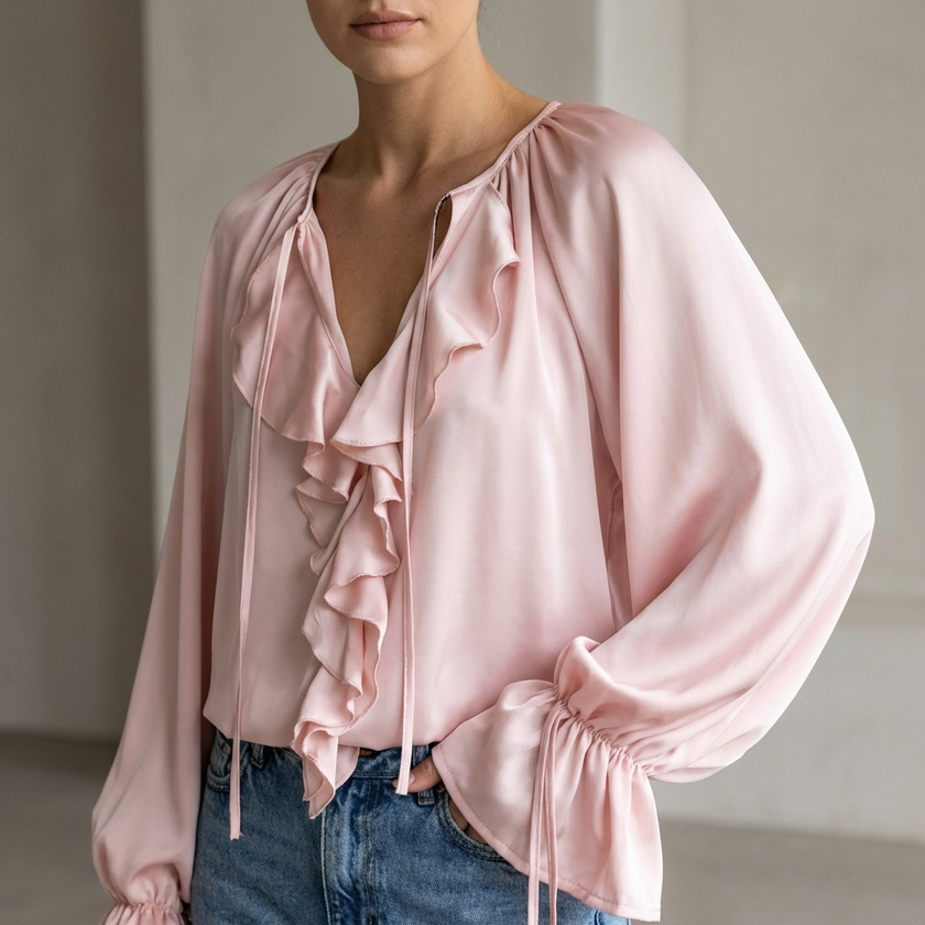 Pink FJØRNA summer blouse for women with a V-neck and lace details, lightweight and stylish top perfect for warm weather.