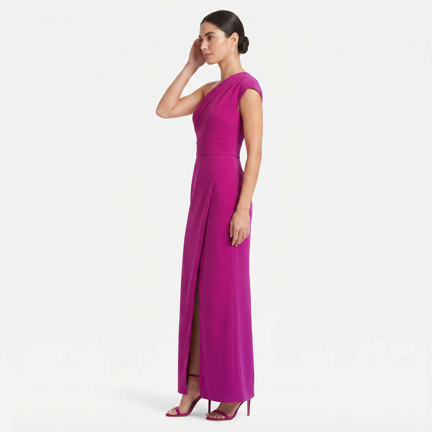 Pink women's one-shoulder maxi evening dress by FJØRNA with an asymmetric neckline, shown in side profile view.