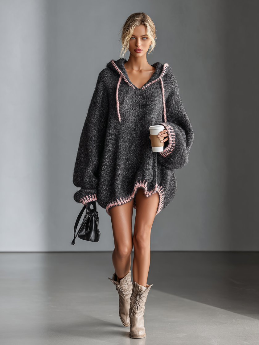 Pink knit hooded mini dress for women by FJØRNA, featuring a cozy hood, fitted silhouette, and soft textured fabric.