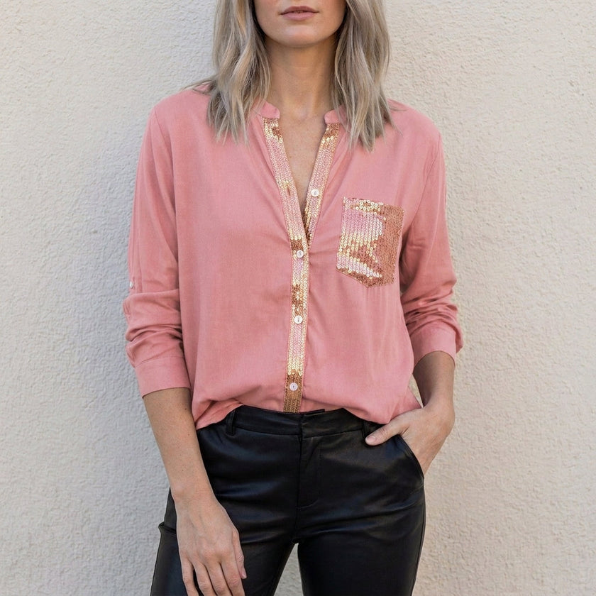 Pink FJØRNA women's summer blouse with V-neck, denim fabric, and button front, stylish top for warm weather.