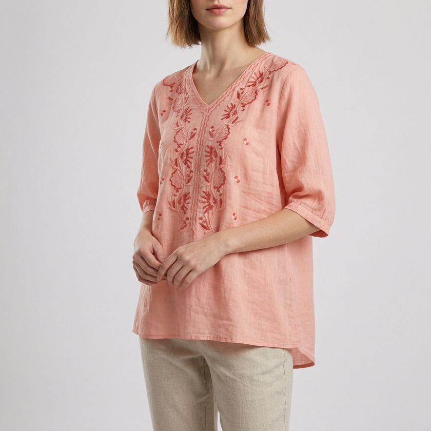 Pink floral linen summer blouse for women with V-neck and slit detail, by FJØRNA, styled as a lightweight, breezy top.
