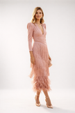 White FJØRNA elegant midi dress with fringe detailing, featuring a sleeveless design and flowing silhouette.