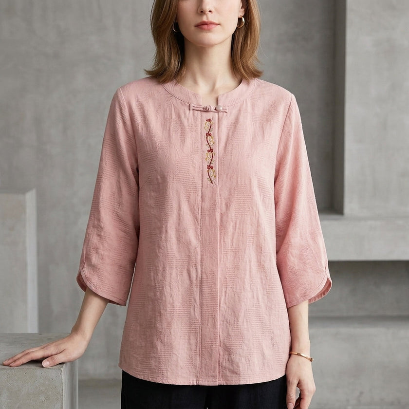 Pink denim tassel summer blouse for women by FJØRNA, featuring a stylish sleeveless design and tassel details.