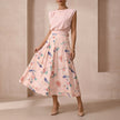 Pink FJØRNA summer two-piece women's co-ord set with pleated design, featuring a stylish top and matching skirt.