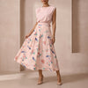 Pink FJØRNA summer two-piece women's co-ord set with pleated design, featuring a stylish top and matching skirt.