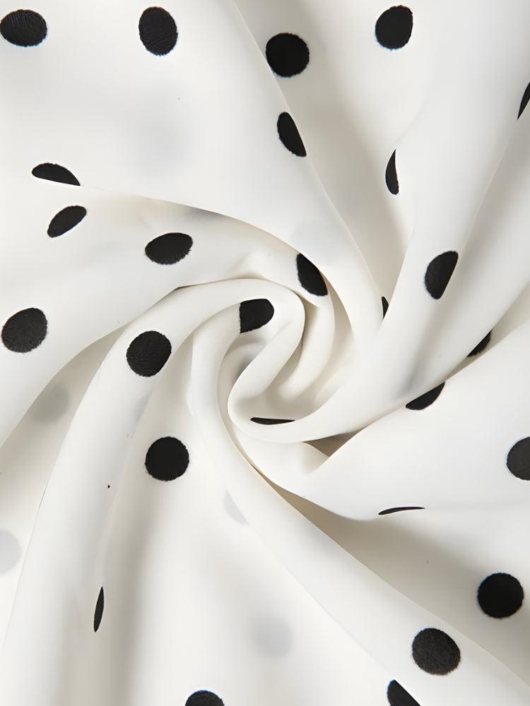 FJØRNA polka dot women's mini dress with short sleeves, perfect for party or daytime wear, featuring a playful dot pattern.