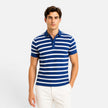 Men's FJØRNA striped polo shirt with breathable fabric, slim fit, and comfortable design for casual wear.