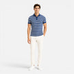Men's FJØRNA striped polo shirt with breathable fabric, slim fit design, and classic style for casual wear.