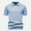 Men's slim fit knit polo shirt by FJØRNA, lightweight and breathable, shown in a stylish men's shirt with a classic collar and short sleeves.
