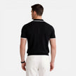 Men's slim fit summer polo shirt from FJØRNA, lightweight and breathable knit fabric, ideal for warm weather.
