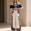 FJØRNA printed crop top and wide-leg pants 2-piece matching set, styled for a fashionable, casual look.