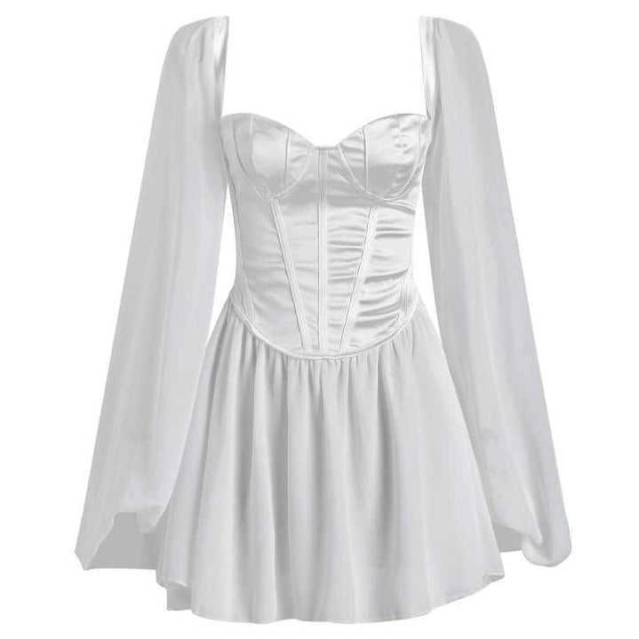 White princess corset dress by FJØRNA, featuring a fitted bodice and flowing skirt, perfect for elegant or Y2K-inspired looks.