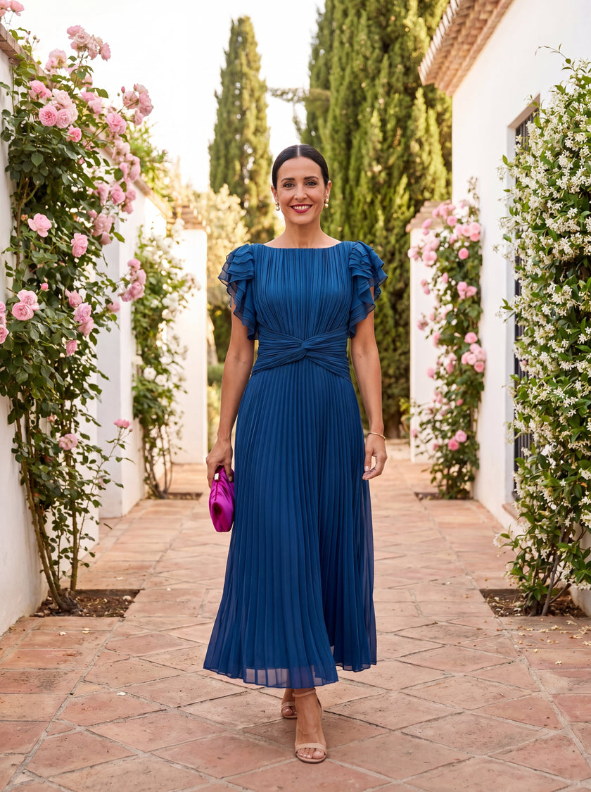FJØRNA elegant mini dress for women with pleated design, suitable for evening or special occasions.