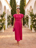 FJØRNA elegant mini dress for women featuring pleated design, suitable for evening wear, in a professional high-end fashion photo.