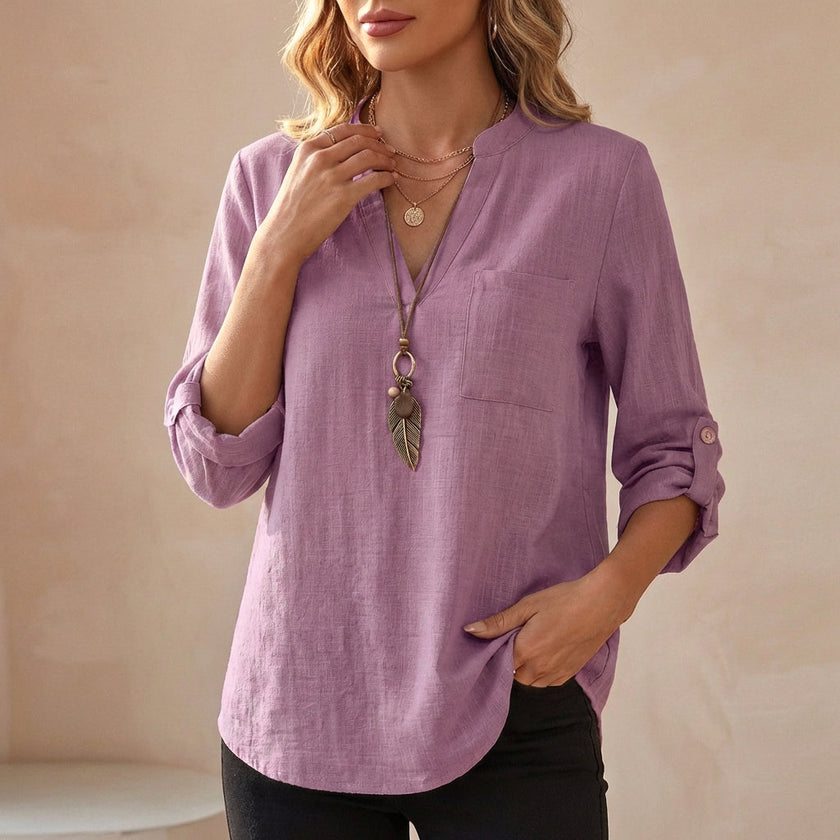 Purple women's summer V-neck linen blouse by FJØRNA, flowy and lightweight, perfect for warm weather.