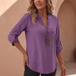 Purple FJØRNA women's relaxed v-neck blouse with band collar and patch pocket, casual top for versatile styling.