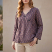 Purple V-neck linen summer blouse for women with slit detail, stylish top from FJØRNA, perfect for warm-weather fashion.