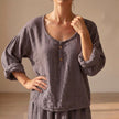 Purple V-neck linen summer blouse for women by FJØRNA, flowy and breathable top perfect for warm weather.