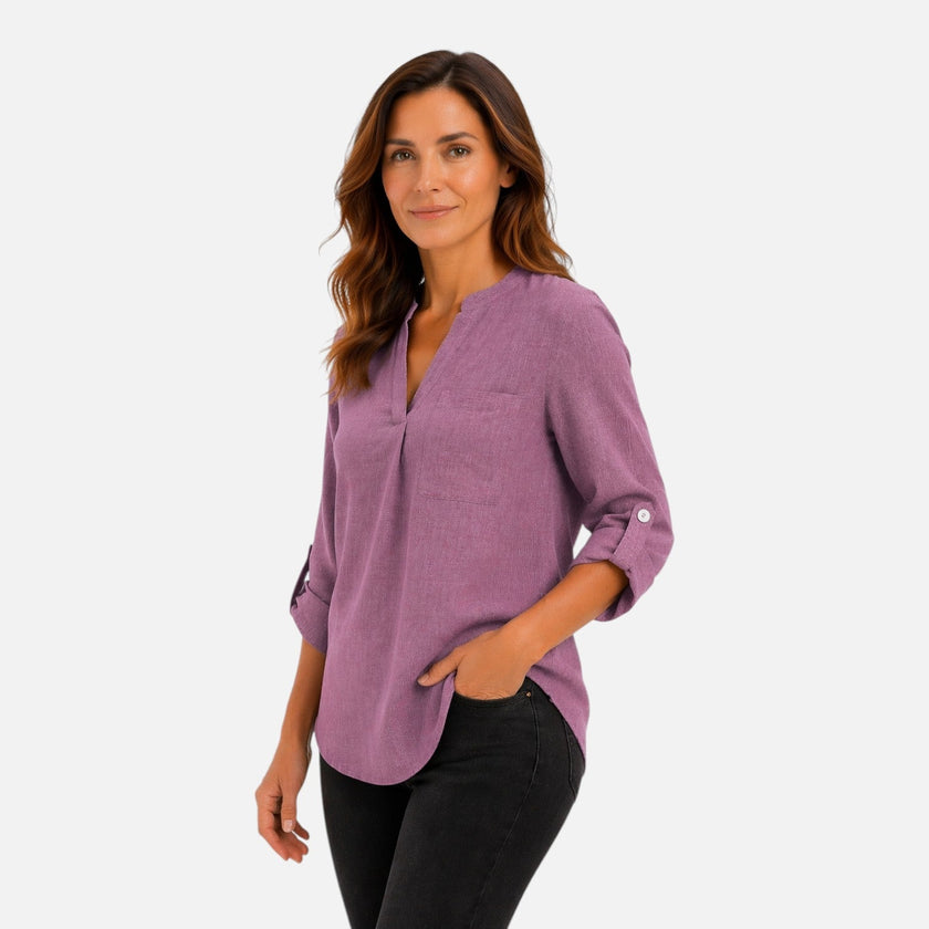 Purple women's long sleeve V-neck blouse by FJØRNA, elegant casual top with a fitted design and soft fabric.