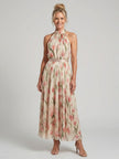 FJØRNA women's floral halter neck midi dress with a quiet statement design, perfect for summer occasions.