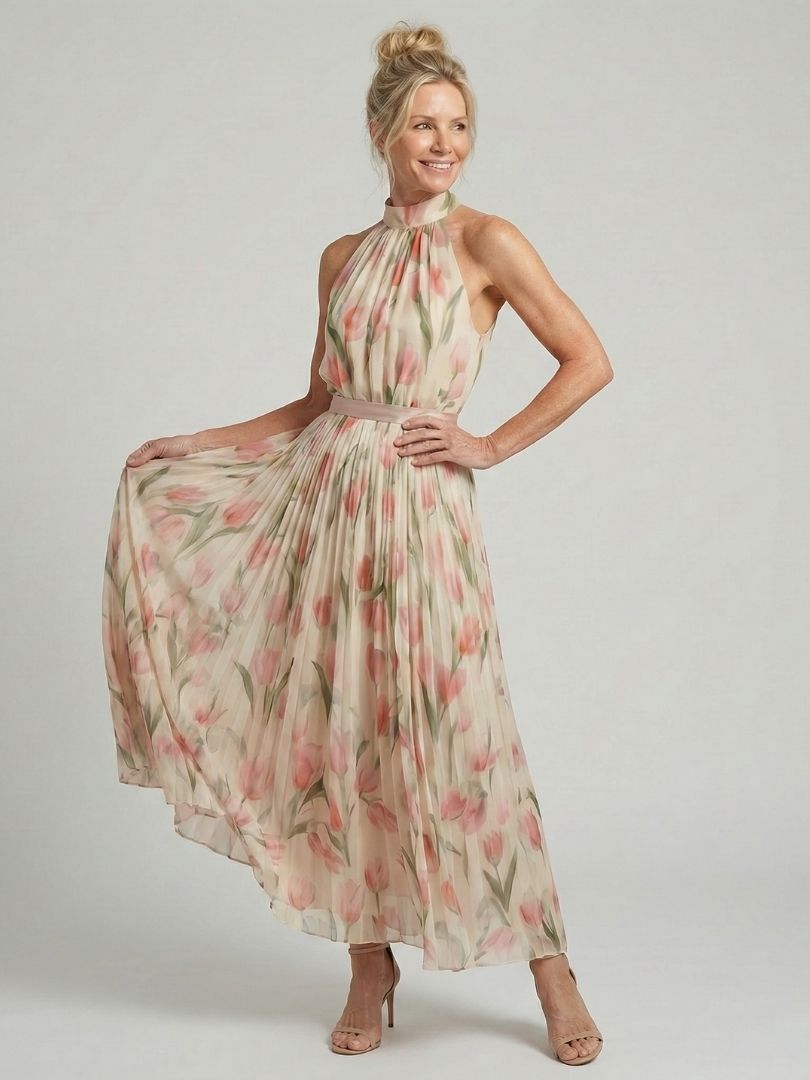 FJØRNA women's floral halter neck midi dress, lightweight summer dress with a stylish halter neckline and vibrant floral pattern.