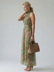 FJØRNA women's floral summer maxi dress with halter neck, gathered waist, flowing midi length, perfect for warm weather.