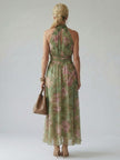 FJØRNA women's summer maxi dress with floral pattern, halter neck, sleeveless, lightweight fabric, perfect for warm weather.