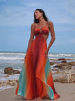 FJØRNA elegant women's maxi dress with cut-out details, perfect for evening wear, flowing fabric and stylish design.