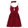 Red velvet halter dress by FJØRNA featuring a tailored fit, showcased on a model, ideal for stylish streetwear or Y2K fashion.