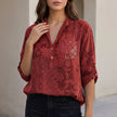 Red floral V-neck denim blouse for women by FJØRNA, featuring a stylish summer top with short sleeves and lightweight fabric.
